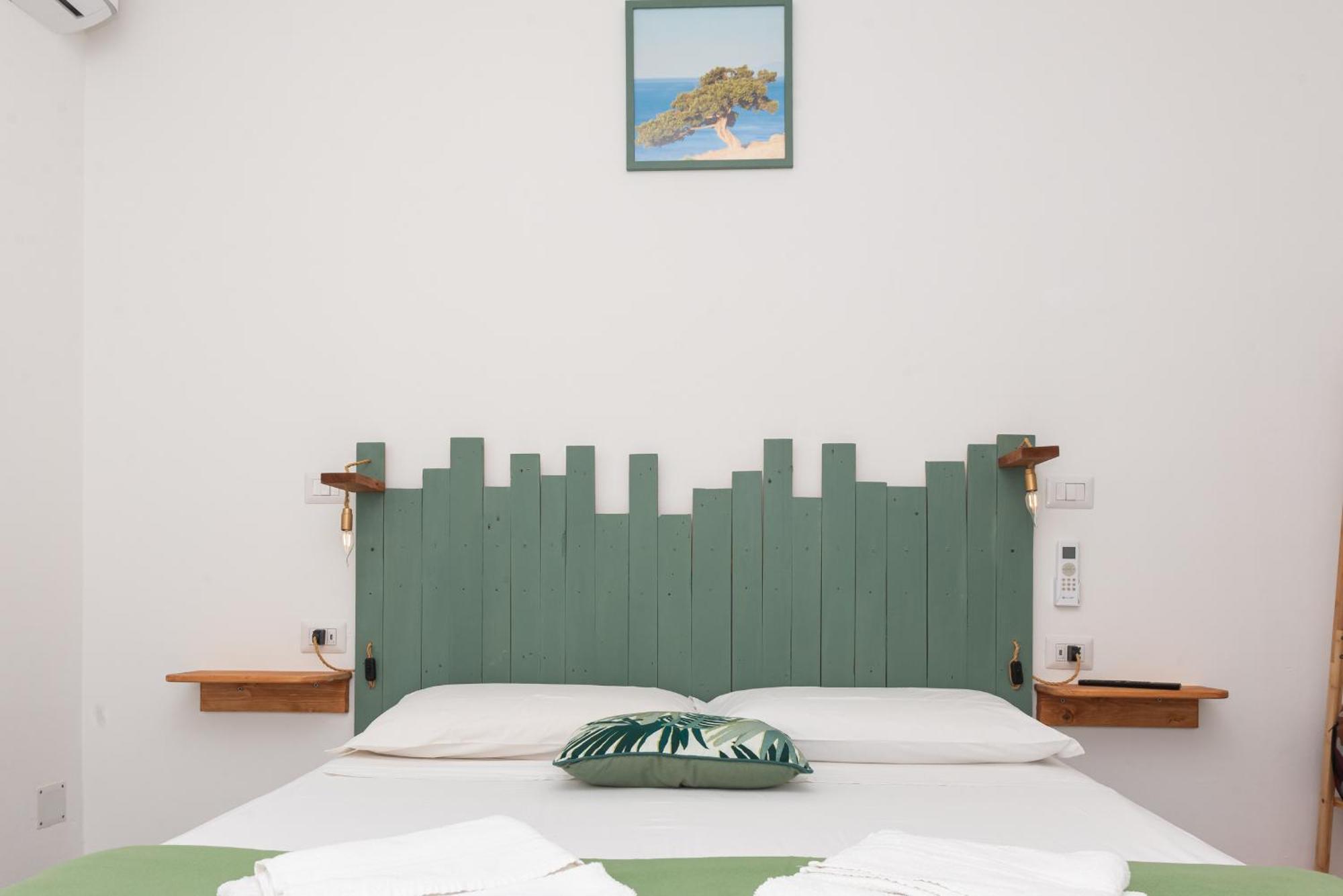 Guest House - Affittacamere Green Apartment - By Faendho Porto Torres Eksteriør bilde